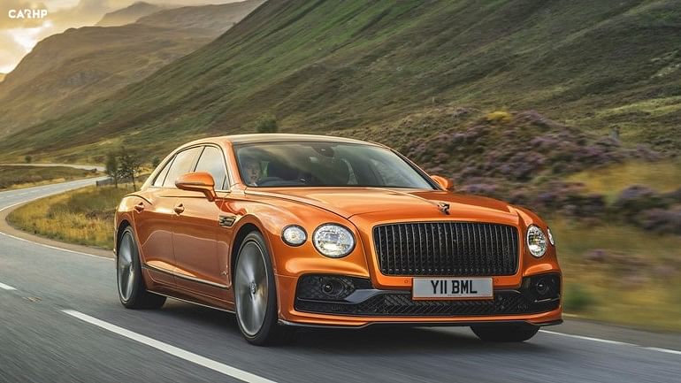 Orange Bentley Flying Spur Speed